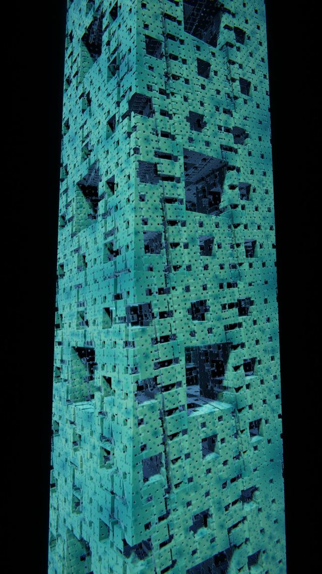A cyan Menger sponge tower with square openings rising into a black sky, seen from near its base